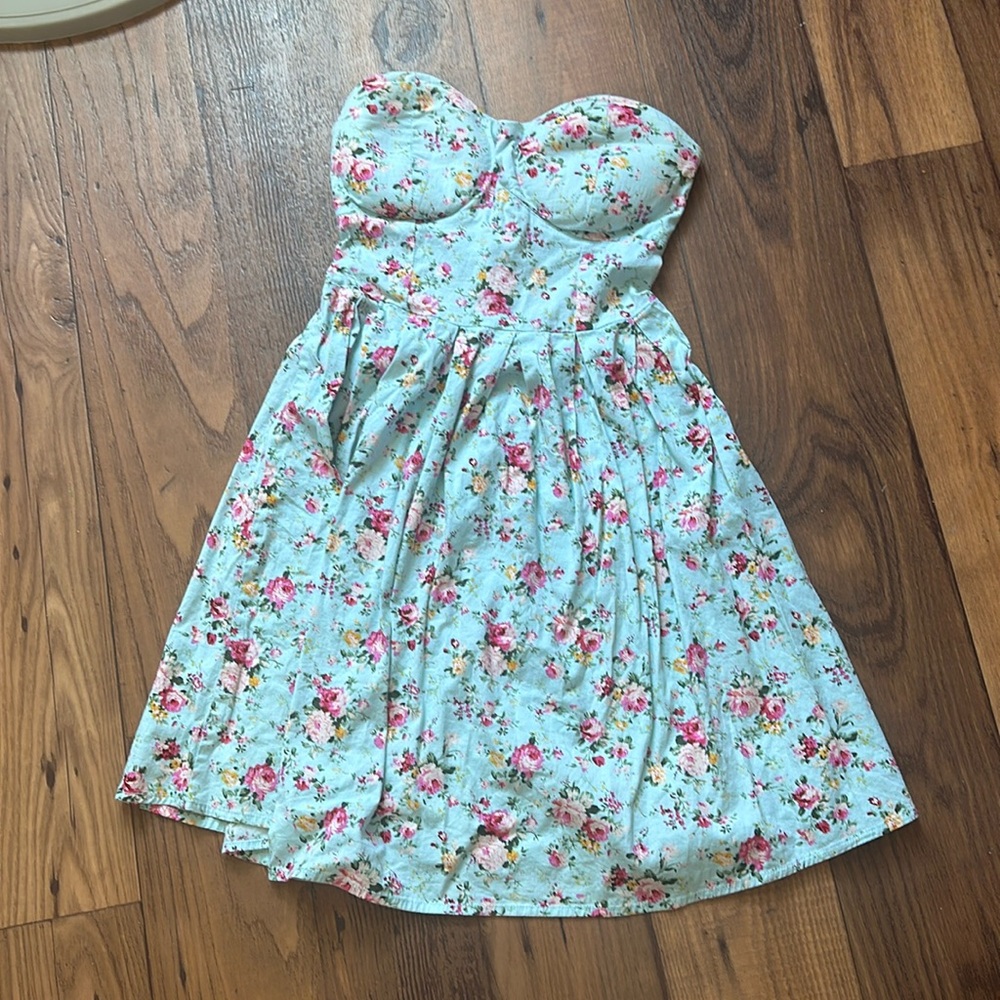 Light blue floral dress with pink,yellow and white flowers.
